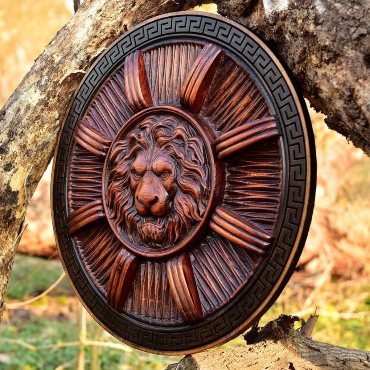 Roman-Inspired Lion Crest Shield with Carved Sunburst Design