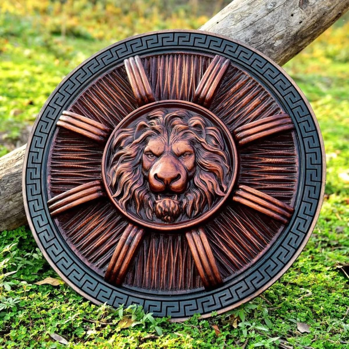 Roman-Inspired Lion Crest Shield with Carved Sunburst Design