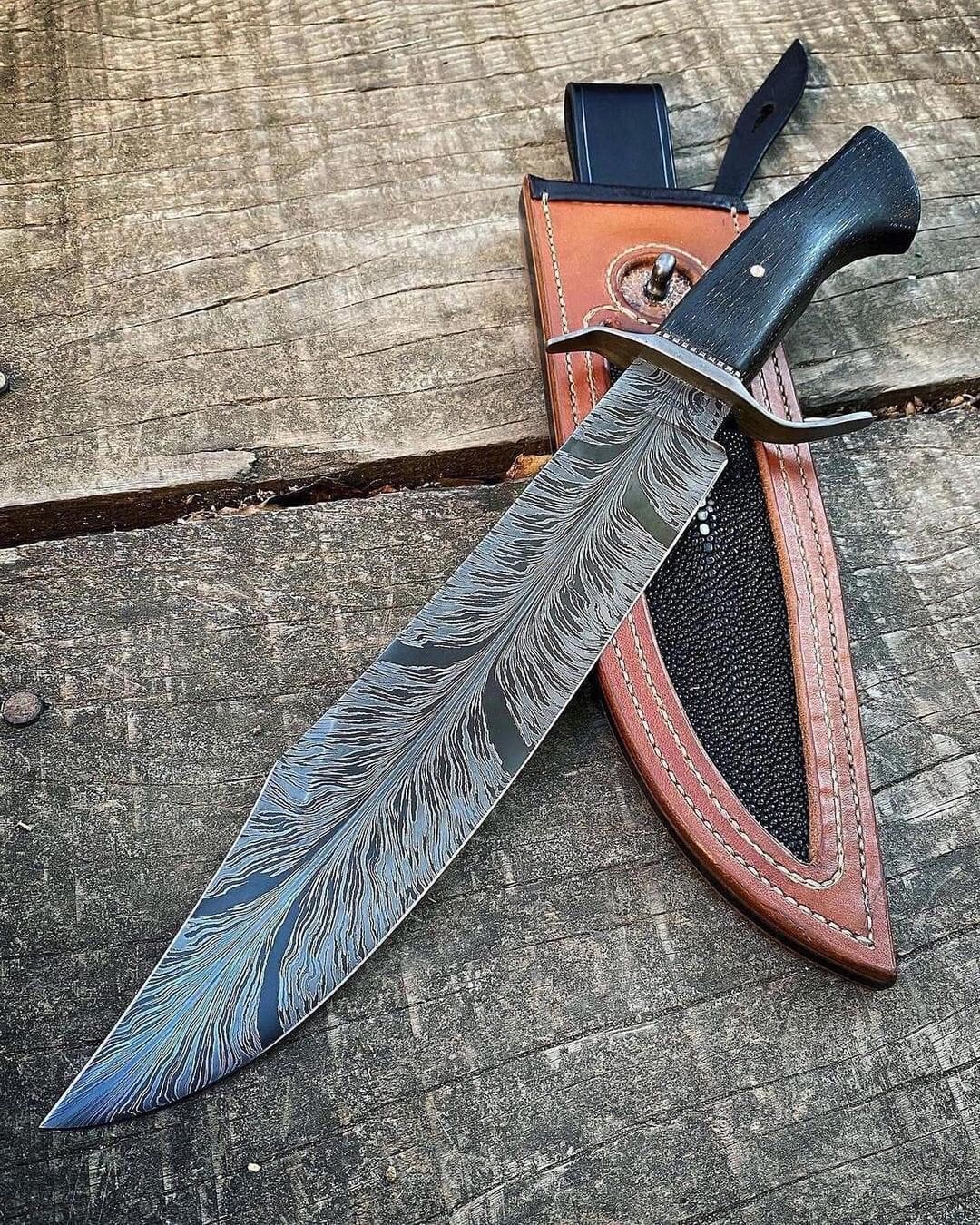 Handcrafted Damascus Bowie Knife with Curved Crossguard and Leather Sheath