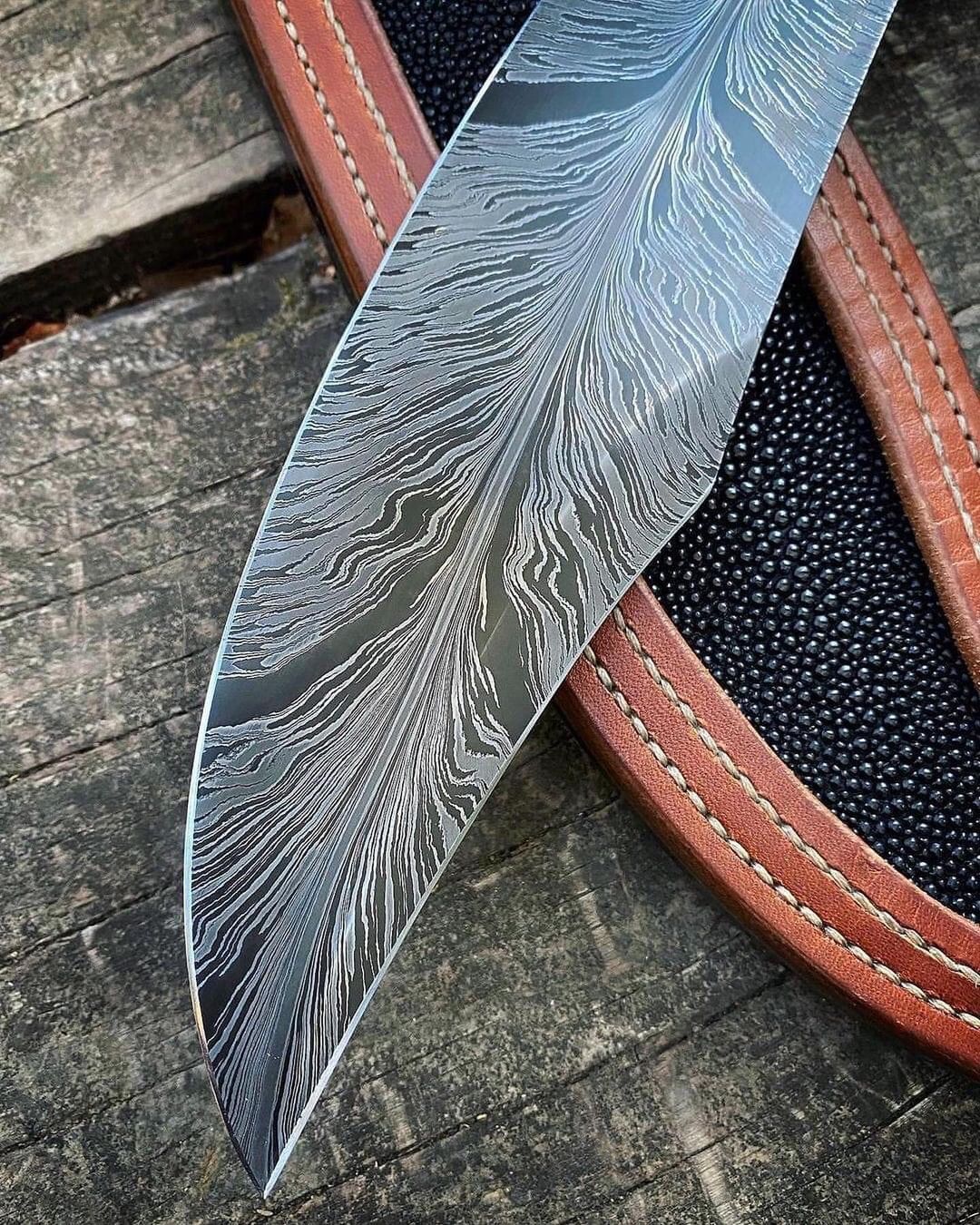 Handcrafted Damascus Bowie Knife with Curved Crossguard and Leather Sheath
